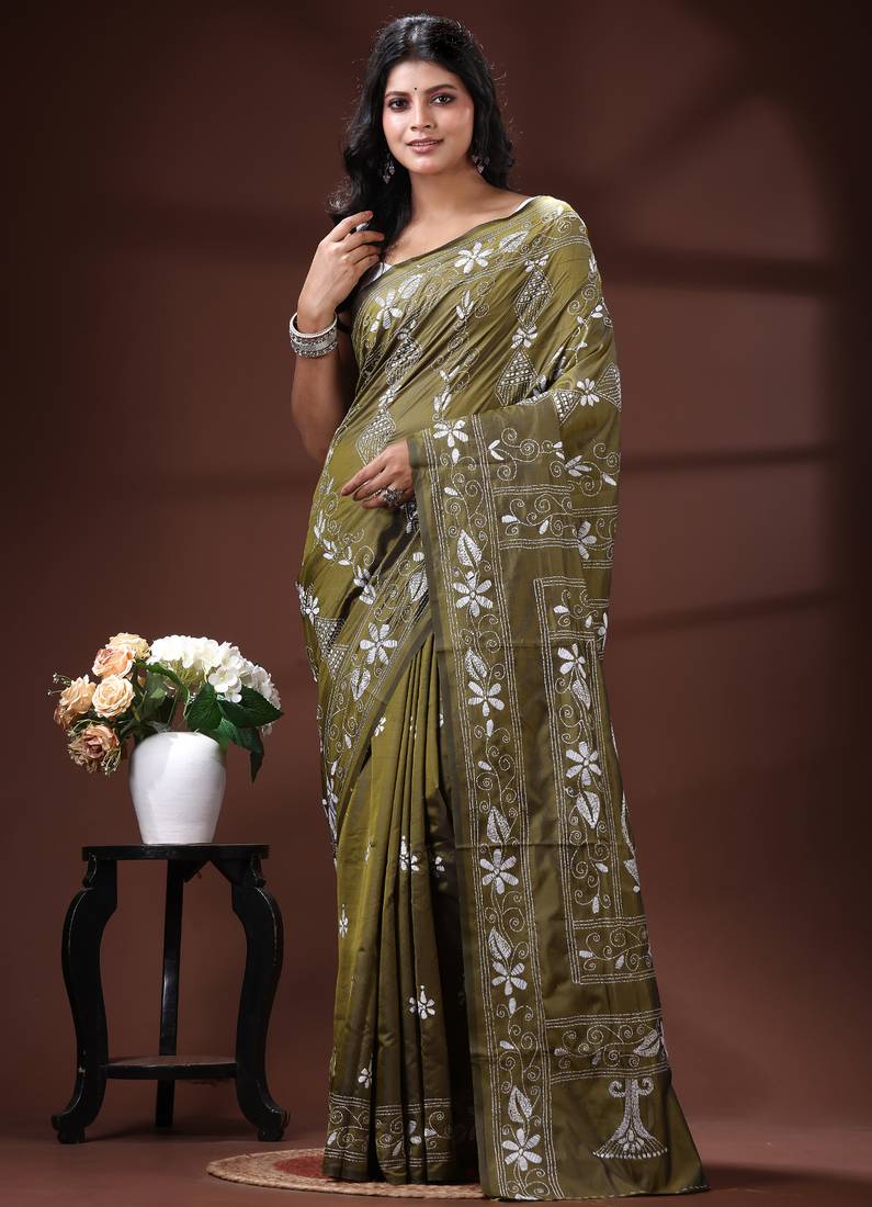 Olive green silk blend kantha saree with intricate white floral nakshi & scalloped pallu