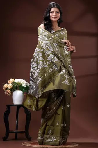 Olive green silk blend kantha saree with intricate white floral nakshi & scalloped pallu