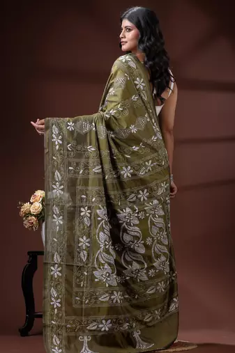 Olive green silk blend kantha saree with intricate white floral nakshi & scalloped pallu