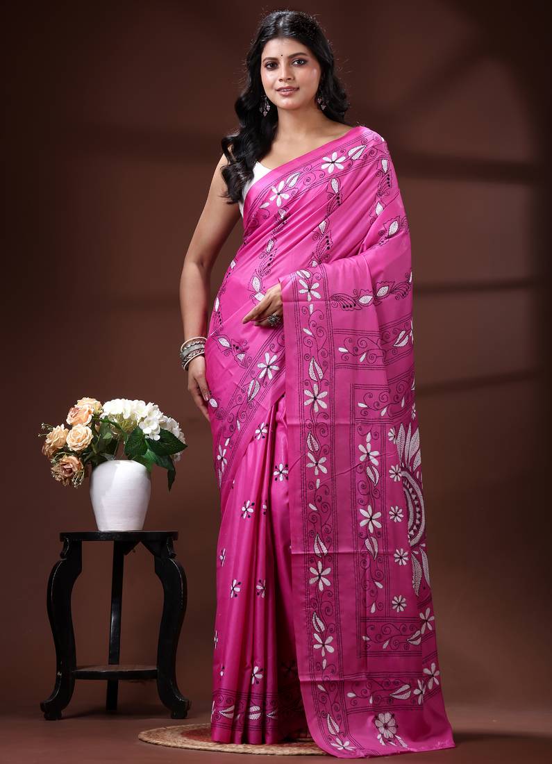 Vibrant rani pink silk blend kantha saree with intricate white floral nakshi & mandala pallu