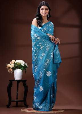 Turquoise blue silk blend kantha saree with white floral & folk art woven design 2