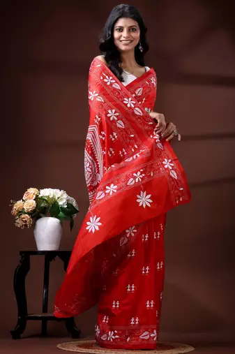 Vibrant red silk blend kantha saree with white floral & paisley woven design