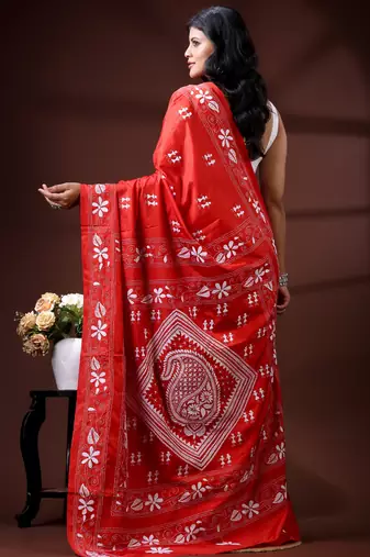 Vibrant red silk blend kantha saree with white floral & paisley woven design