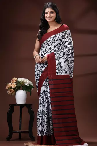 Maroon & monochrome malmal cotton saree with hand-block leaf prints and striped pallu