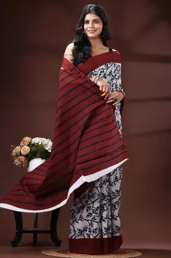 Maroon & monochrome malmal cotton saree with hand-block leaf prints and striped pallu