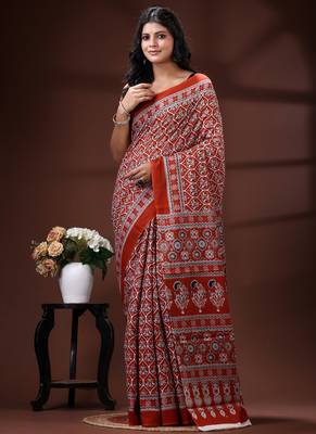 Rust red  malmal cotton saree with all-over traditional hand-block prints and panelled pallu 1