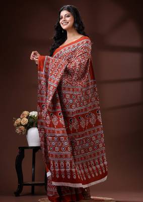 Rust red  malmal cotton saree with all-over traditional hand-block prints and panelled pallu 2