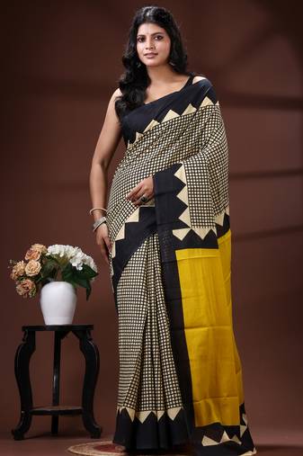 Bold geometric malmal cotton saree in black & cream with vibrant yellow block borders