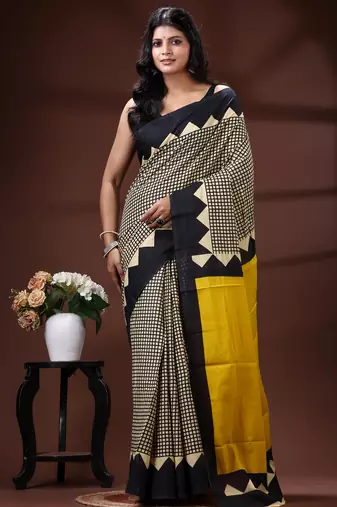 Bold geometric malmal cotton saree in black & cream with vibrant yellow block borders