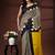 Bold geometric malmal cotton saree in black & cream with vibrant yellow block borders