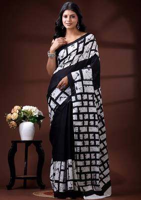 Monochrome abstract grid malmal cotton saree with bold black & white batik-style prints 1