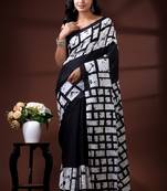 Monochrome abstract grid malmal cotton saree with bold black & white batik-style prints