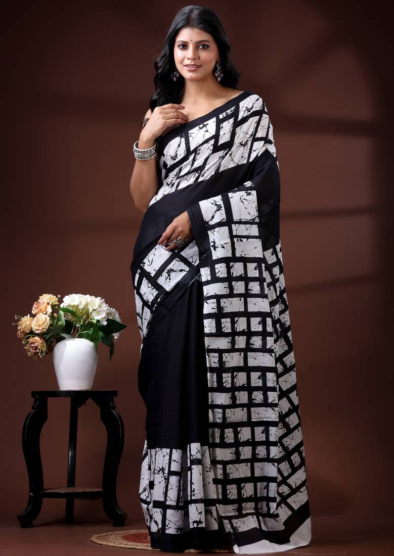 Monochrome abstract grid malmal cotton saree with bold black & white batik-style prints