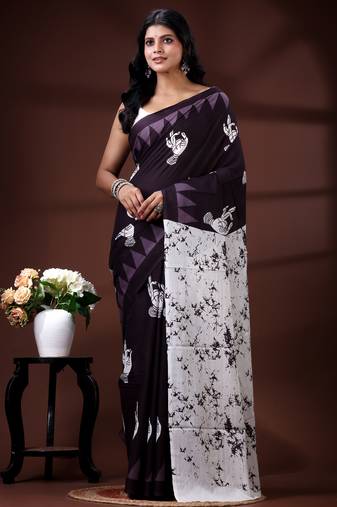 Deep wine malmal cotton saree with white bird & temple block prints and abstract panelled pallu