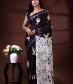 Deep wine malmal cotton saree with white bird & temple block prints and abstract panelled pallu