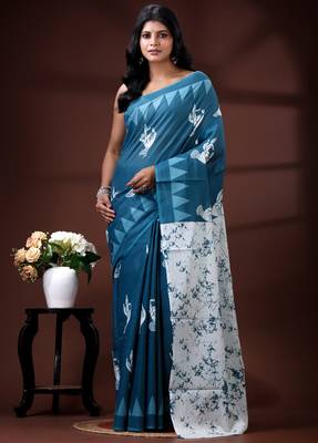 Ocean teal malmal cotton saree with white bird motifs and geometric temple border prints 1