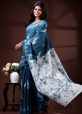 Ocean teal malmal cotton saree with white bird motifs and geometric temple border prints 2
