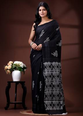 Jet black  malmal cotton saree with white floral butis and ornate geometric pallu 1