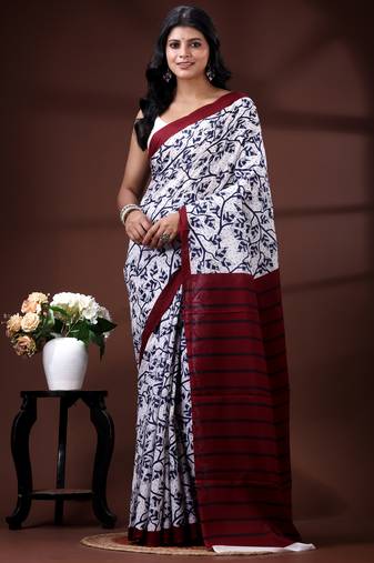 Indigo blue & white malmal cotton saree with hand-block leaf prints and contrast maroon pallu