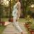 Womens cream viscose rayon floral printed boat neck regular top