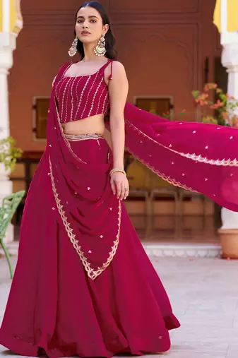 Royaly Rani Pink Thread Embroidered Silk Festival Wear Lehenga Choli