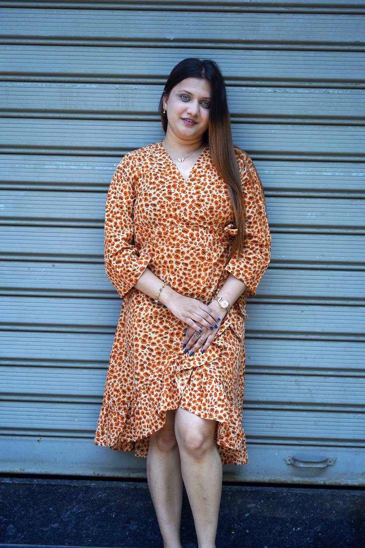 orange printed frill dress