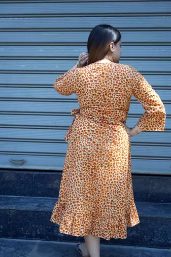 orange printed frill dress
