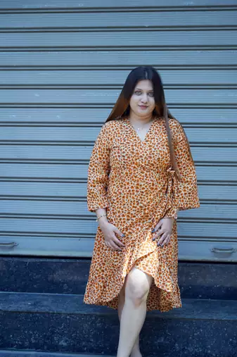orange printed frill dress