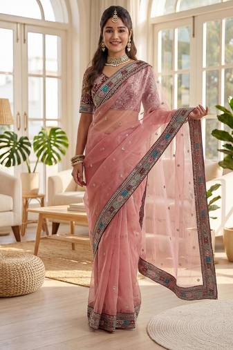Pink organza silk saree with embroidery work & lace border