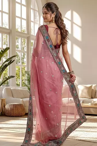 Pink organza silk saree with embroidery work & lace border