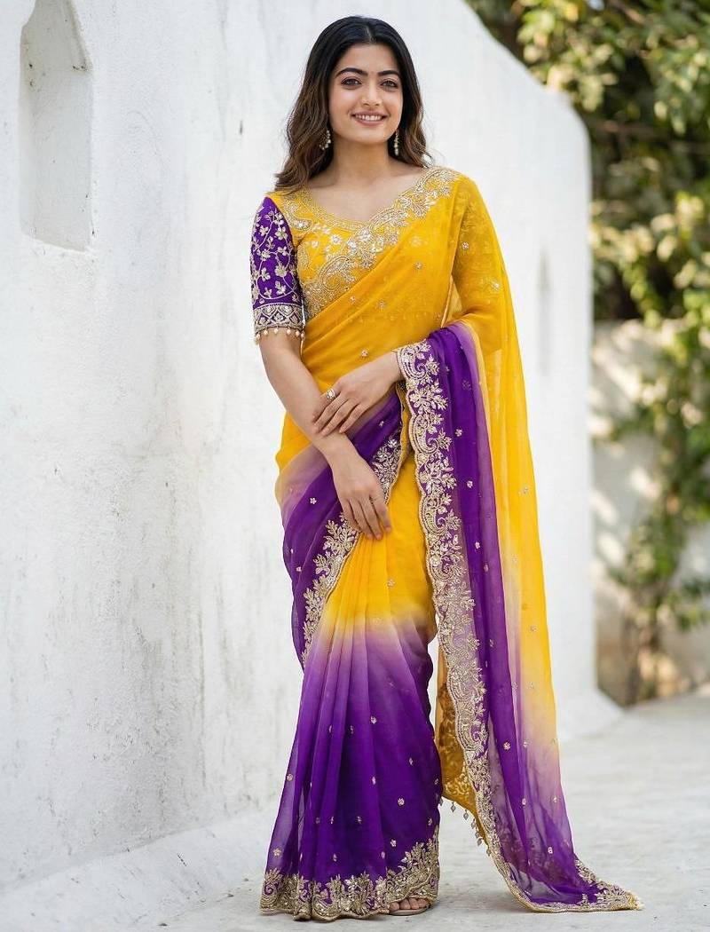 yellow- blue satin silk blend multi sequin embroidered saree