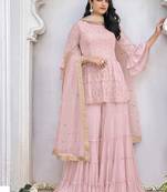 Heavy georgette party wear sharara suit in light pink color with embroidery work