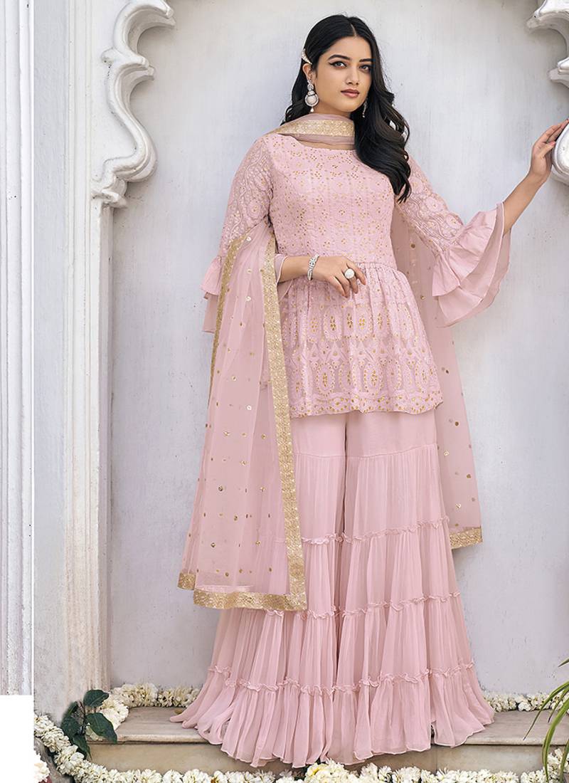 Heavy georgette party wear sharara suit in light pink color with embroidery work