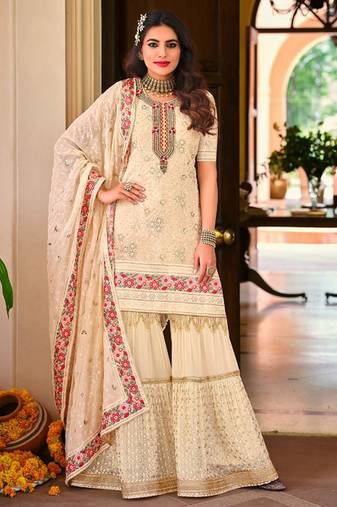 Faux georgette party wear readymade sharara suit in off white color with embroidery work