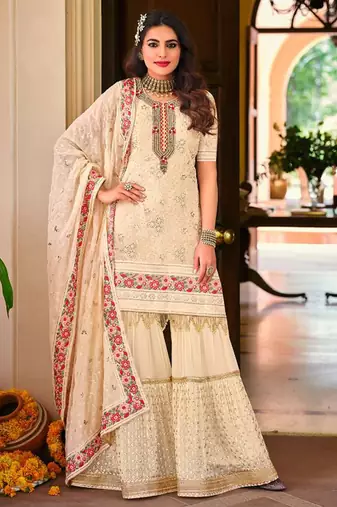 Faux georgette party wear readymade sharara suit in off white color with embroidery work