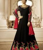 Heavy georgette party wear gown in black color with stone work