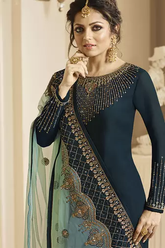Pure silk party wear salwar suit in teal color with embroidery & crystal stone work
