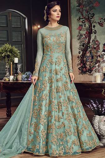Soft premium net party wear readymade gown in turquoise color with zari with stone work