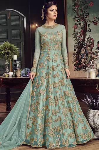 Soft premium net party wear readymade gown in turquoise color with zari with stone work