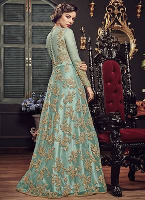 Soft premium net party wear readymade gown in turquoise color with zari with stone work 2