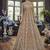Soft premium net wedding wear gown in light brown color with embroidery & stone work