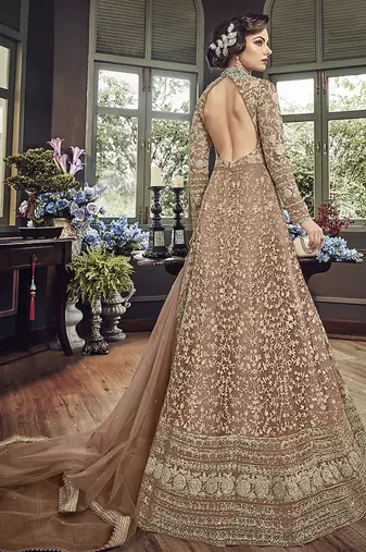 Soft premium net wedding wear gown in light brown color with embroidery & stone work