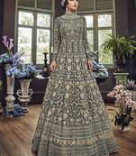 Soft premium net wedding wear gown in grey color with embroidery & stone work