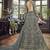 Soft premium net wedding wear gown in grey color with embroidery & stone work