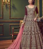 Silk wedding wear gown in maroon color with embroidery & stone work