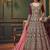 Silk wedding wear gown in maroon color with embroidery & stone work