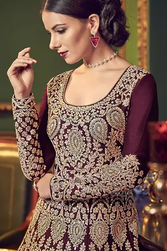 Silk wedding wear gown in maroon color with embroidery & stone work