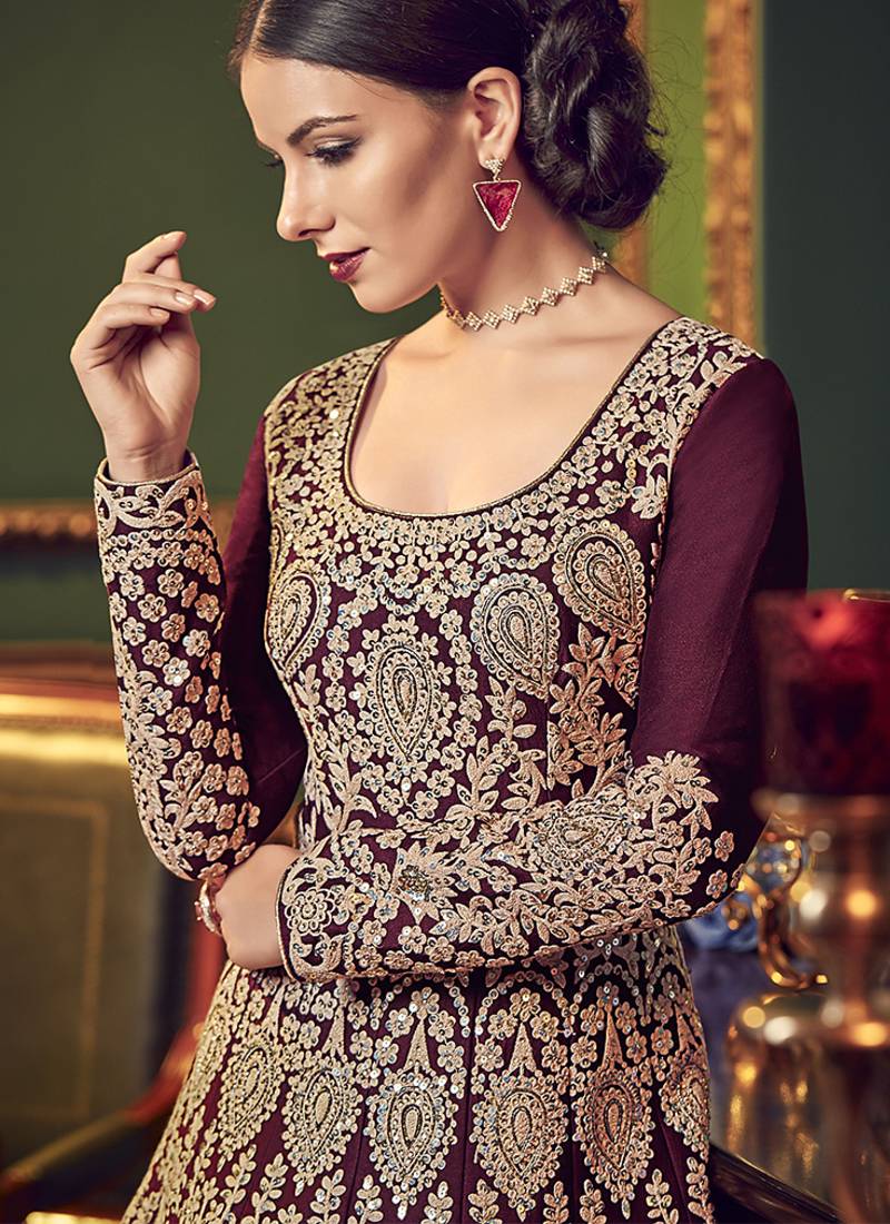 Silk wedding wear gown in maroon color with embroidery & stone work