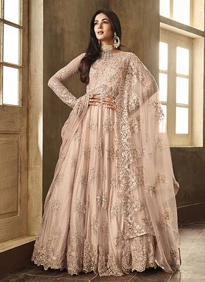 Soft net party wear gown peach color with zari with embroidery & stone work 1