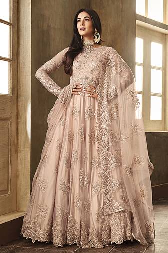 Soft net party wear gown peach color with zari with embroidery & stone work